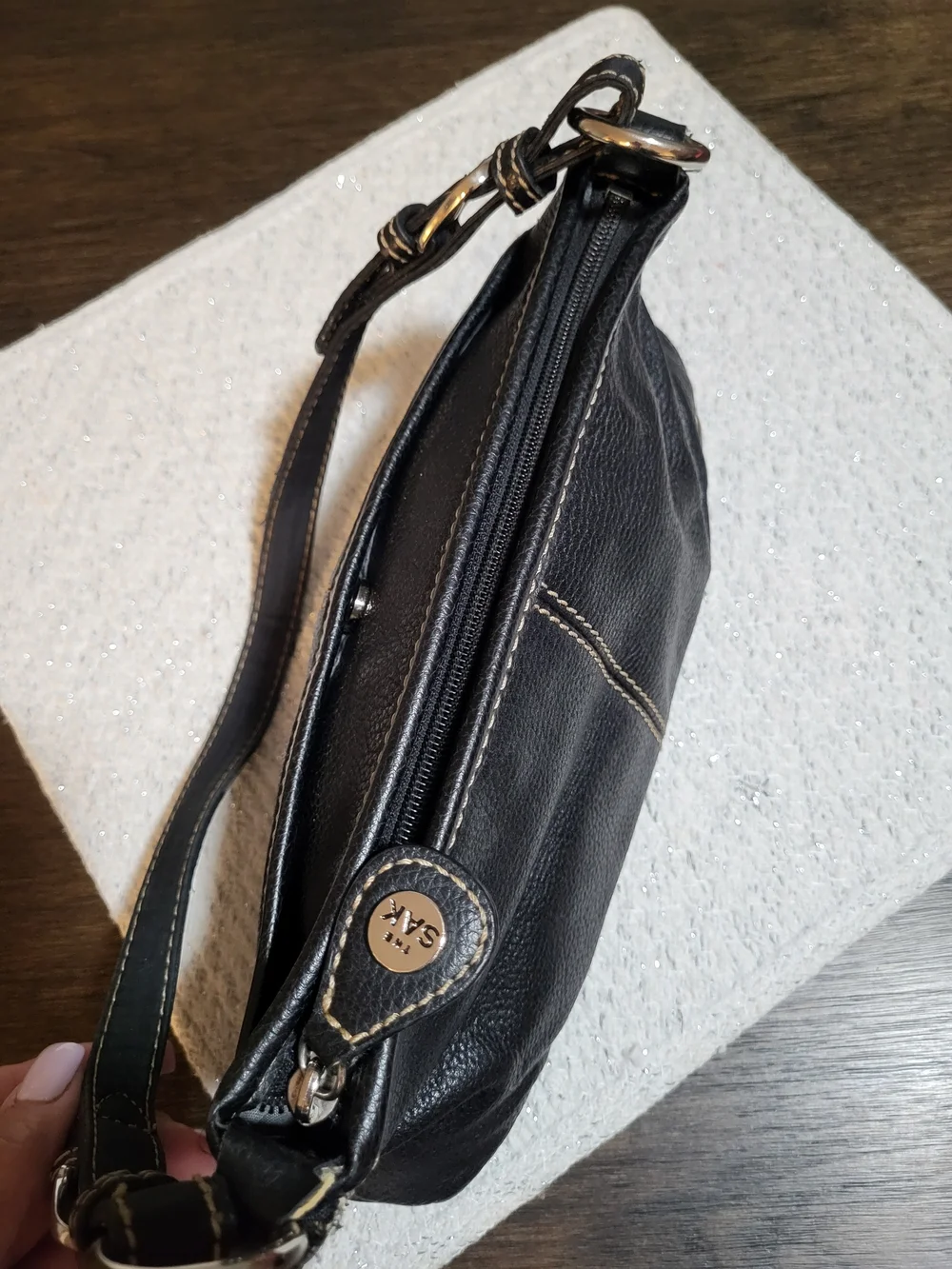 The Sak sleek black